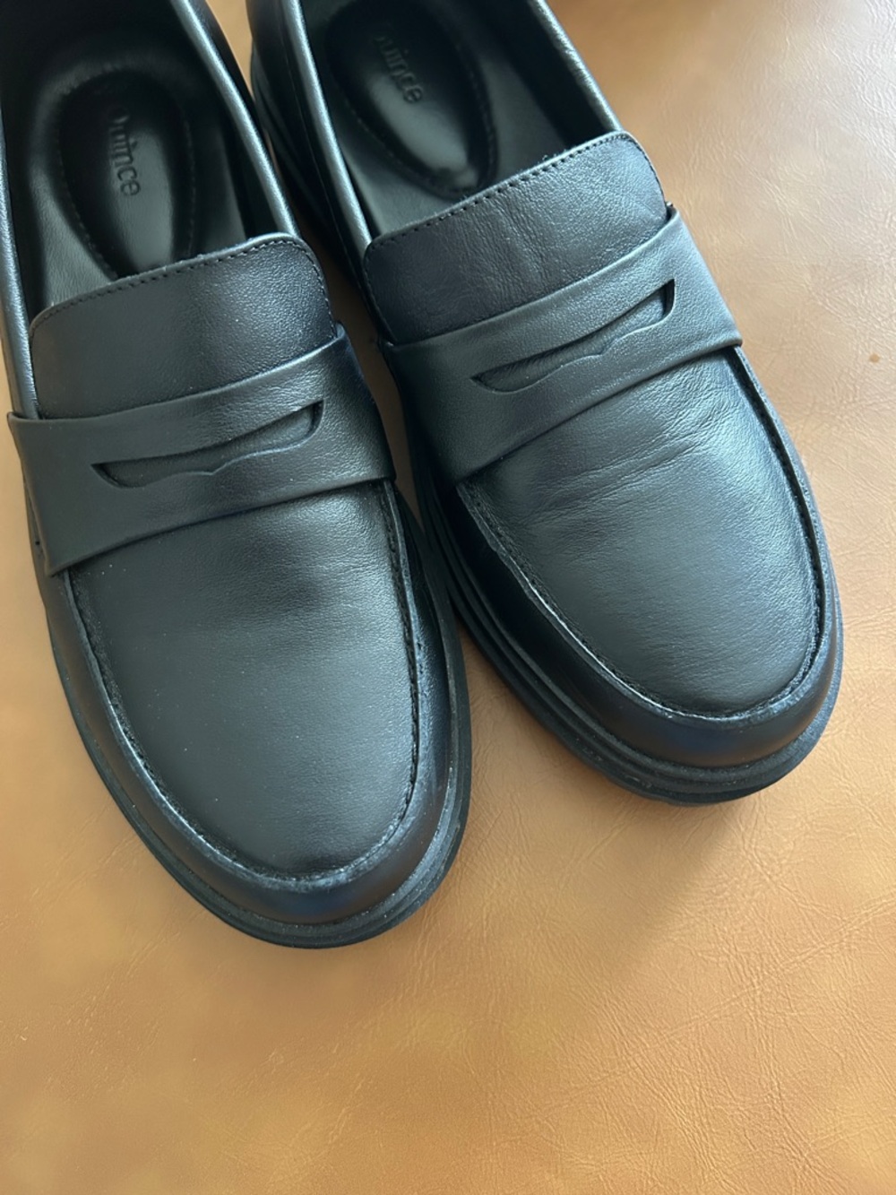 Black Leather Lug-Sole Penny Loafers - Women's - Picture 4 of 9